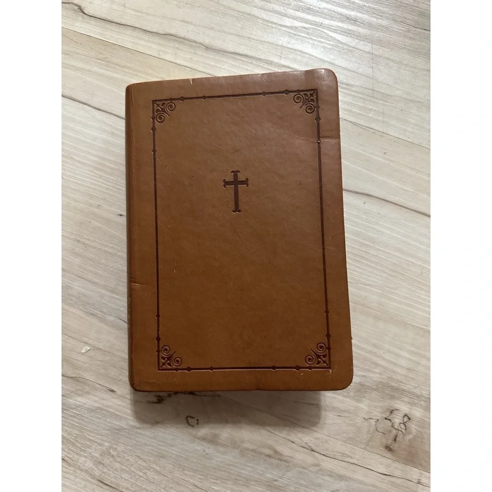 Zondervan NIV Trimline‎ Bible with a brown Italian Leather Duo-Tone cover